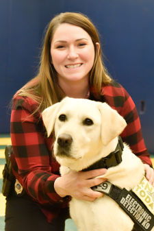 A police woman and a K9. 